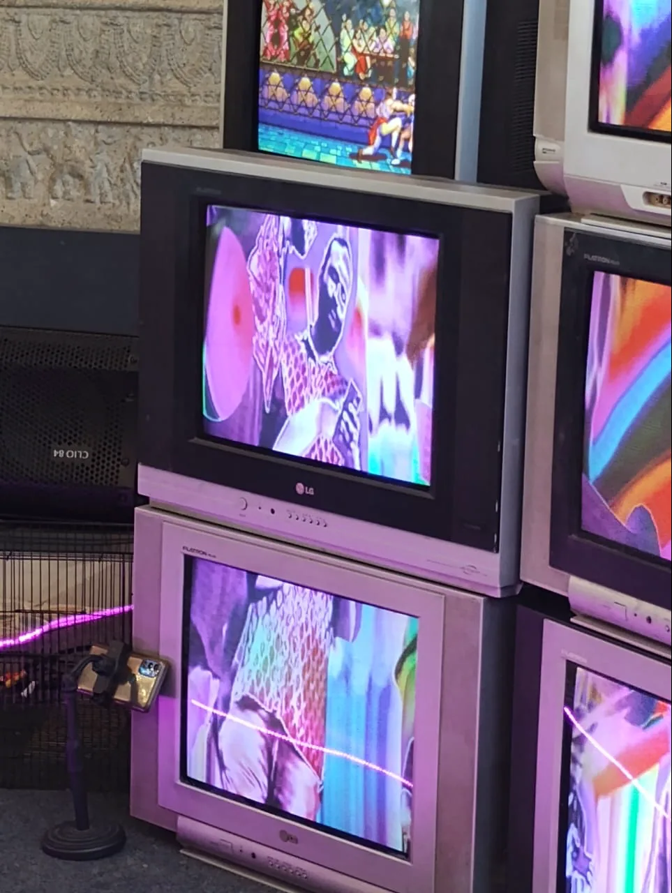 Close view of the skewed screens carrying fragments of a single feed.