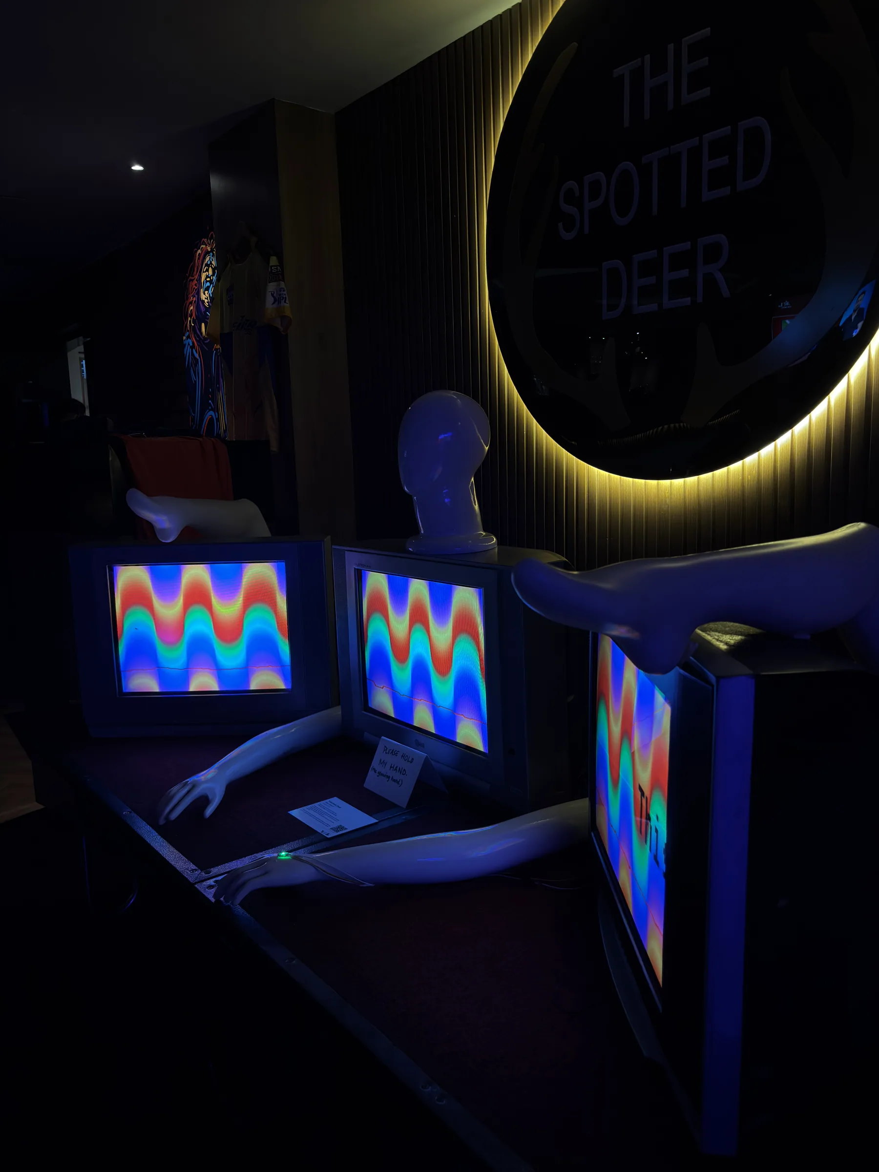 Alternate view of the CRT televisions, sensor and mannequin limbs.